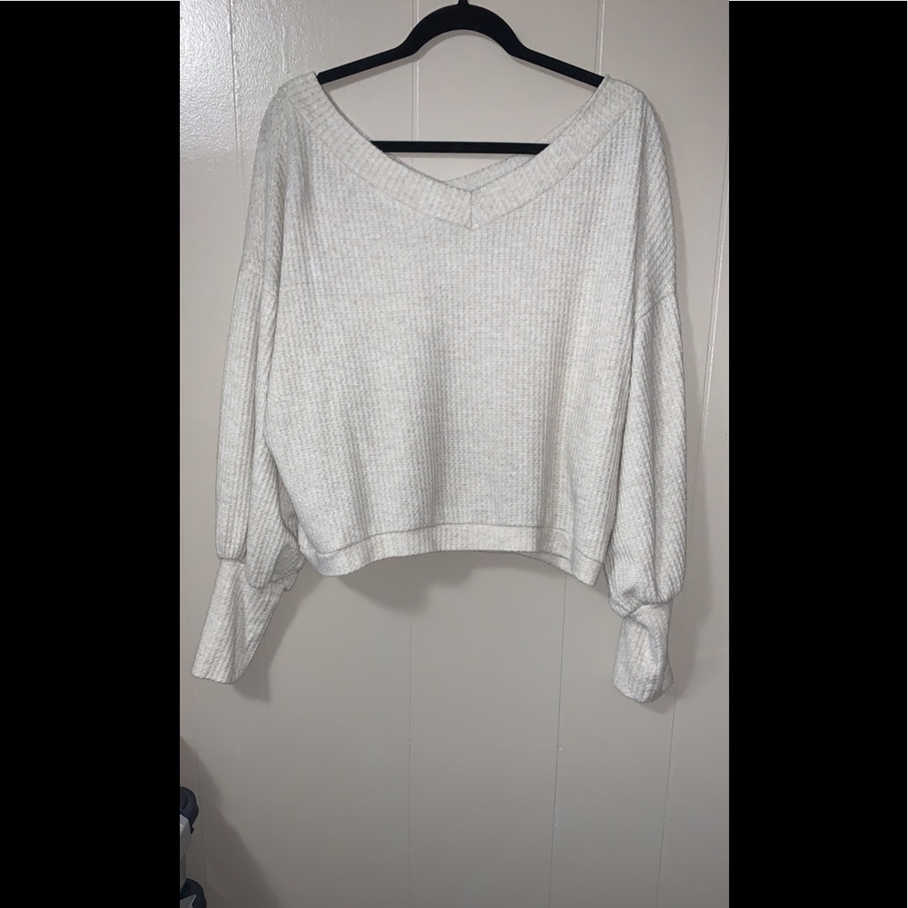 Cream colored off the shoulder sweater